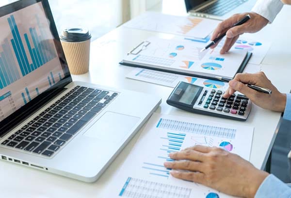 [background image] image of a work desk with a laptop and documents (for a ai legal tech company)